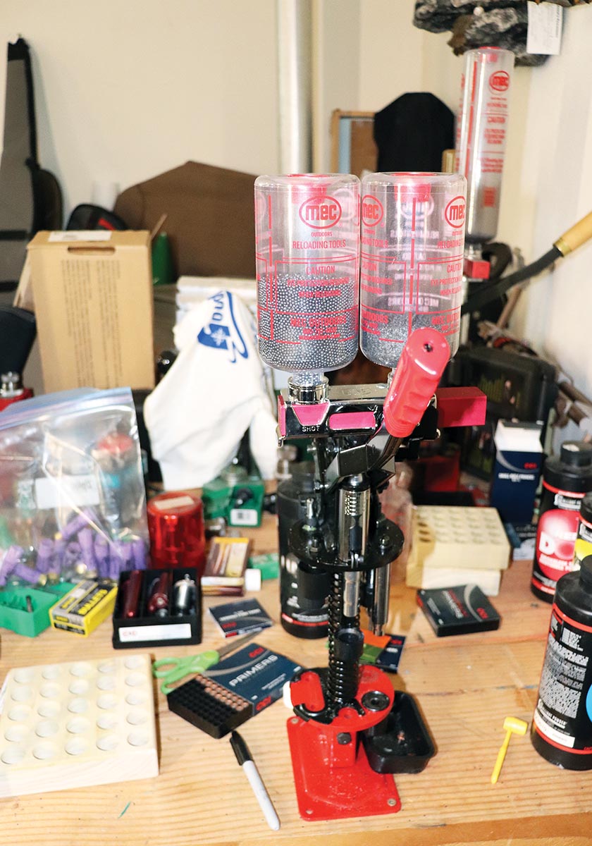 At the loading bench, a MEC 600 Jr. reloading press.